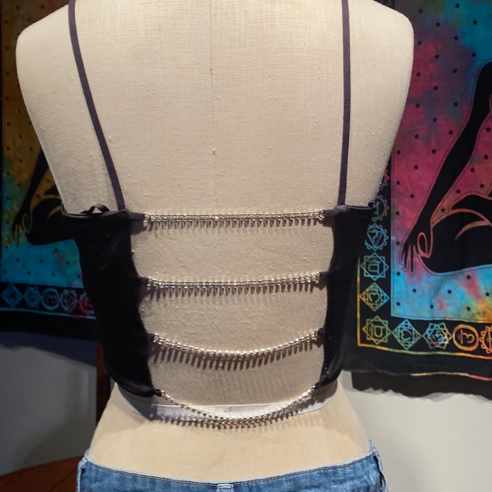 Sheet crop tank with rhinestone back.